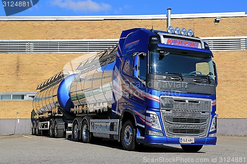 Image of New Volvo FH Tank Truck by a Warehouse 