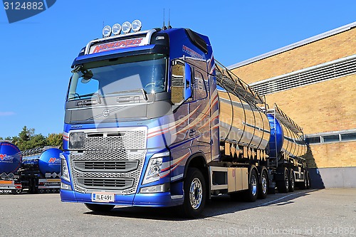 Image of New Volvo FH Tank Truck by a Warehouse