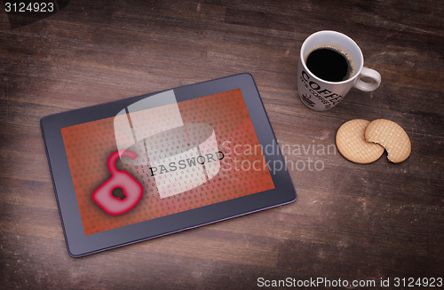 Image of Tablet on a desk, concept of data protection