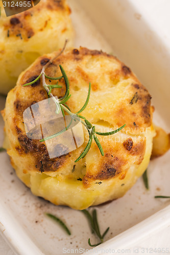 Image of potato gratin with fresh rosemary