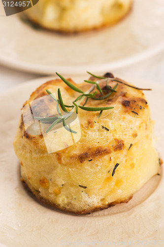 Image of potato gratin with fresh rosemary