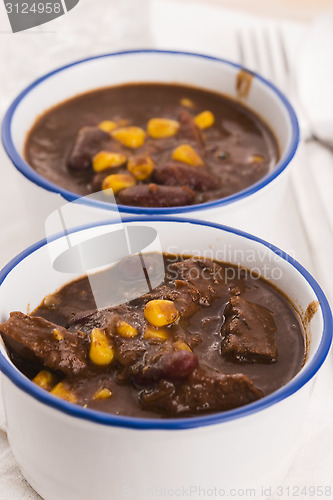 Image of Tasty winter traditional hot pot stew with meat and vegetables 