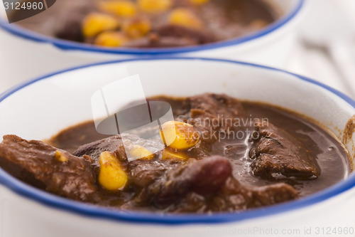 Image of Tasty winter traditional hot pot stew with meat and vegetables 