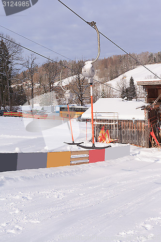 Image of Ironing a ski lift in a winter landscape