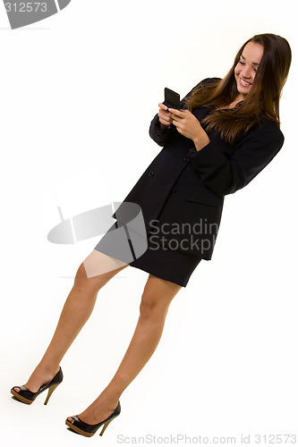 Image of Business woman texting