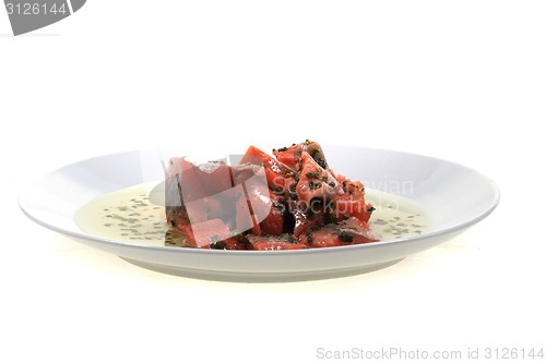 Image of salmon fish with green herbs