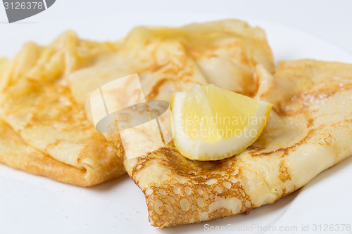 Image of English pancake and lemon