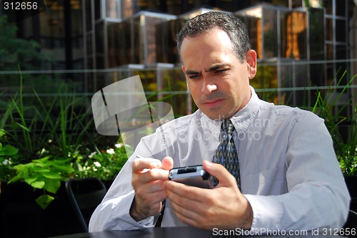 Image of Businessman pda