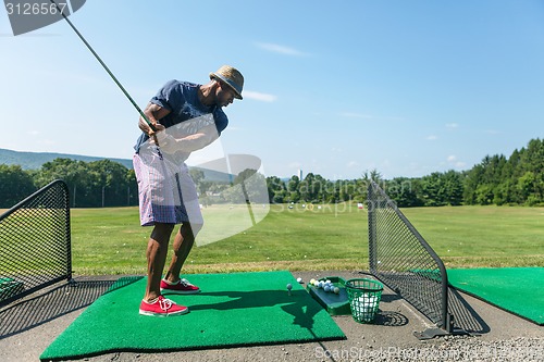 Image of Golf Practice at the Driving Range