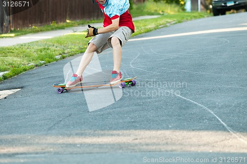 Image of Longboarder Teen