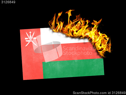 Image of Flag burning - Oman
