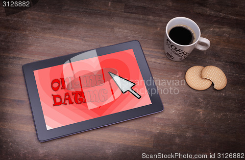 Image of Online dating on a tablet