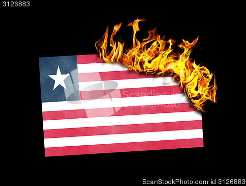 Image of Flag burning - Liberia