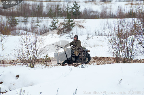 Image of Armed motorbike