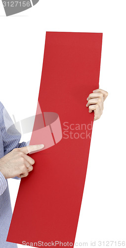 Image of Hand holdong a paper.