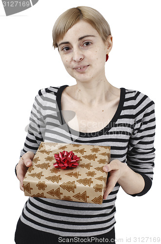 Image of Young woman holding a present