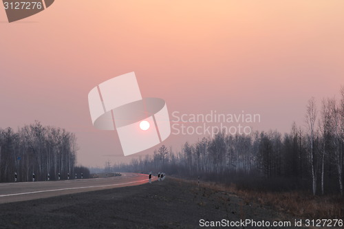 Image of Road to Siberia in winter sunset.