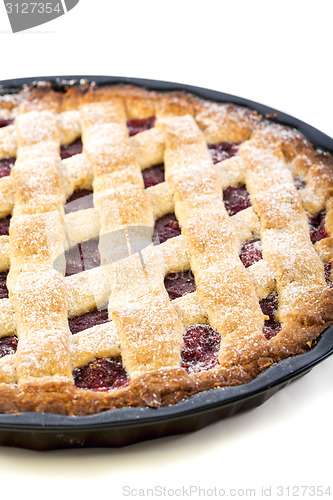 Image of Cake with raspberries closeup.