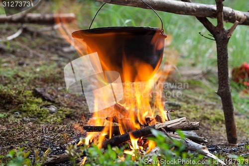 Image of Tourist kettle on fire