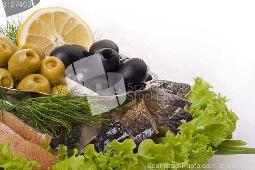 Image of A composition with smoked herring pieces