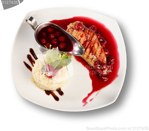 Image of Delicious beef with cherry sauce. File includes clipping path