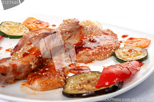 Image of Bone beef platter. Teppan-yaki dish