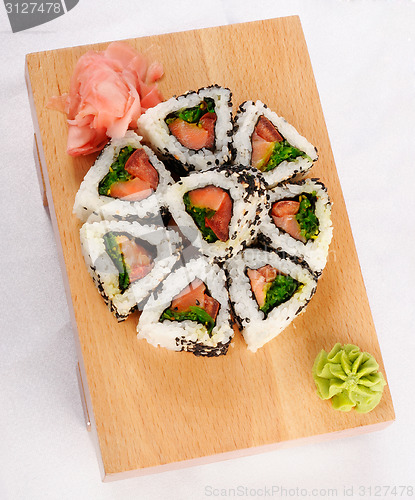 Image of Sushi rolls with tuna and green onion