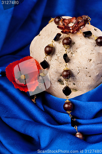 Image of Necklace, flower and stone