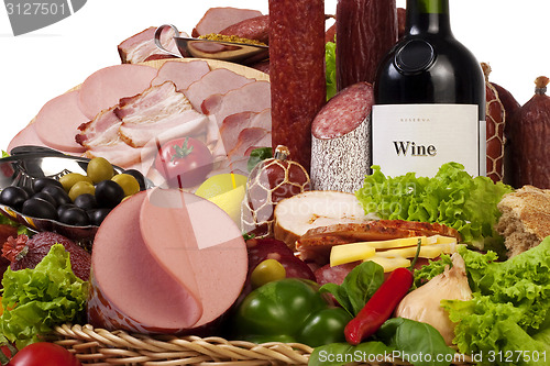 Image of A composition of meat and vegetables with wine