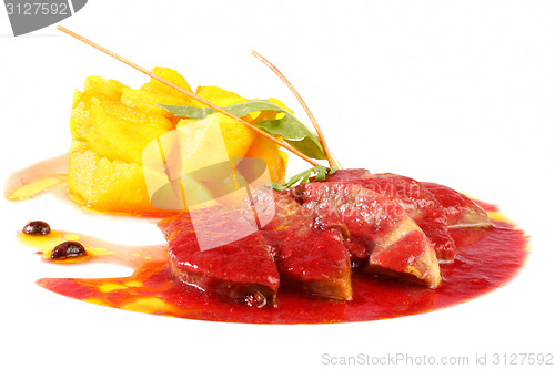 Image of Pork with cherry sauce and pineapple on white background