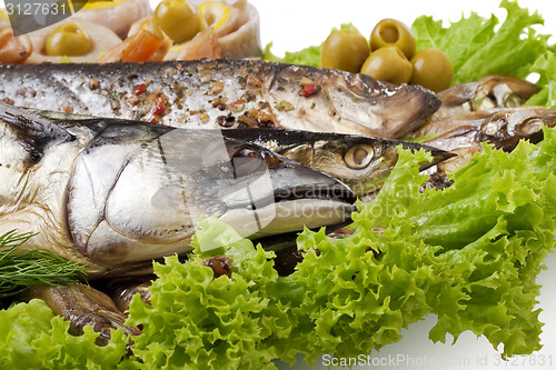 Image of A fish set with vegetables