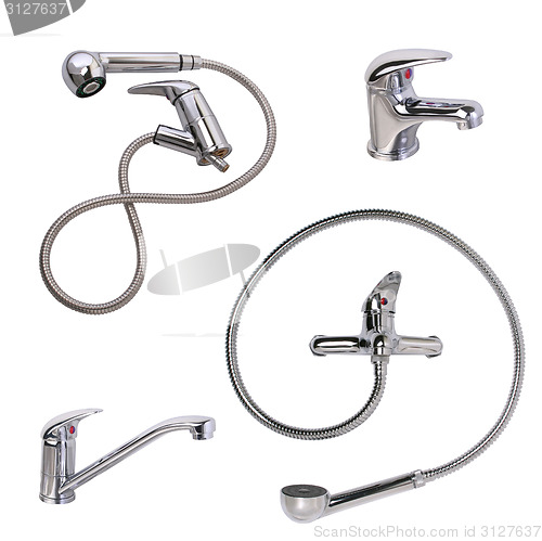 Image of A set of sanitary taps and shower heads, closeup, isolated on wh