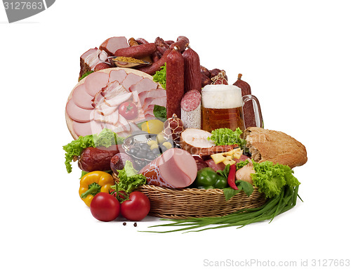 Image of A composition of meat and vegetables with beer