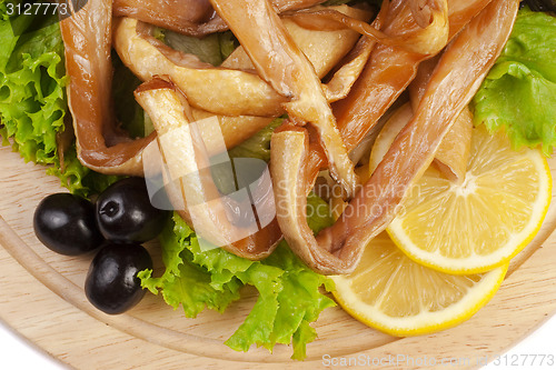 Image of A composition with smoked salmon bellies