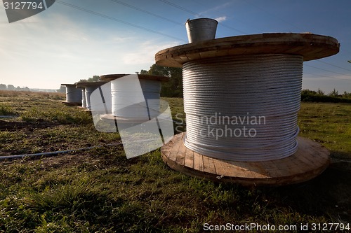 Image of Bobbins with electric power wire