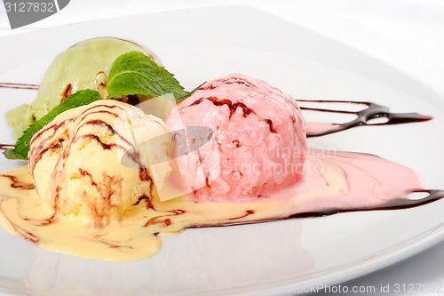 Image of Colored ice cream closeup on white background