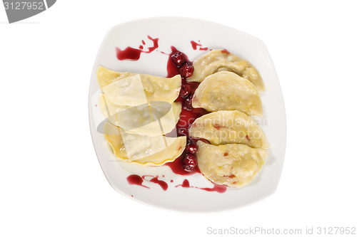 Image of Ukrainian national dish varenyky (ravioli) with cherry