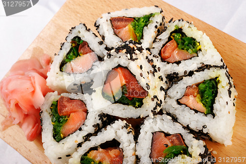 Image of Sushi rolls with tuna and green onion