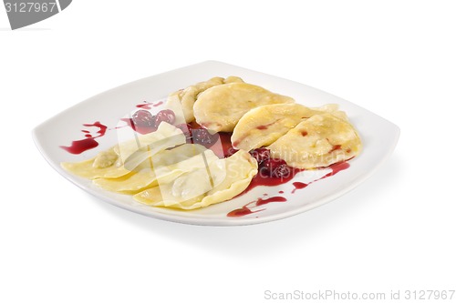 Image of Ukrainian national dish varenyky (ravioli) with cherry