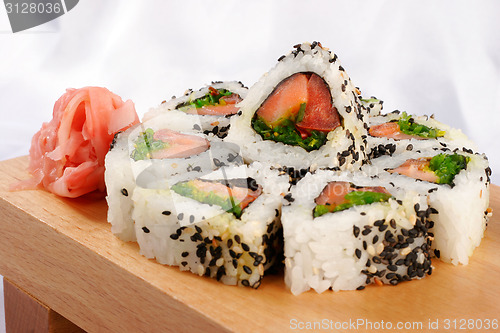 Image of Sushi rolls with tuna and green onion