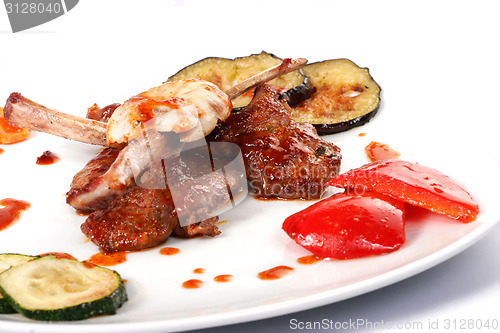 Image of Bone lamb platter. Teppan-yaki dish
