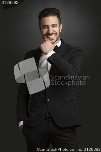 Image of Latin man wearing a tuxedo