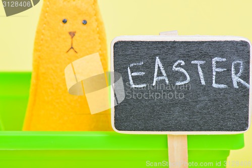 Image of Blackboard with easter bunny on the background