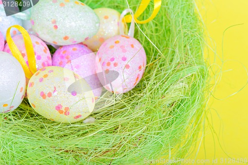 Image of Easter eggs in green nest 