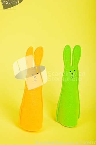 Image of Two easter Bunnys on yellow