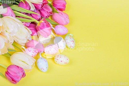 Image of Easter multicolored tulips and eggs