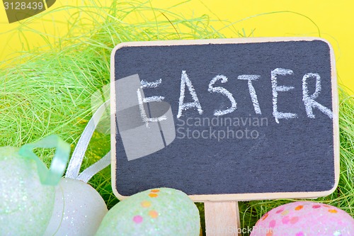 Image of Miniature blackboard with easter eggs