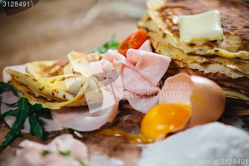 Image of pancakes with ham cheese and vegetables