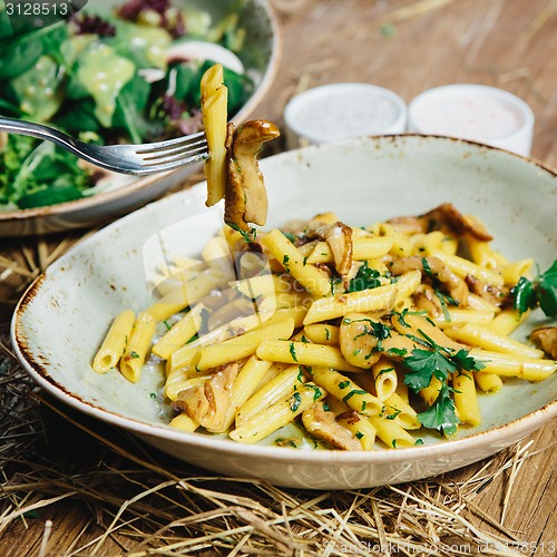 Image of pasta penne with mushrooms