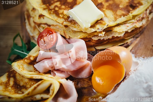 Image of pancakes with ham cheese and vegetables